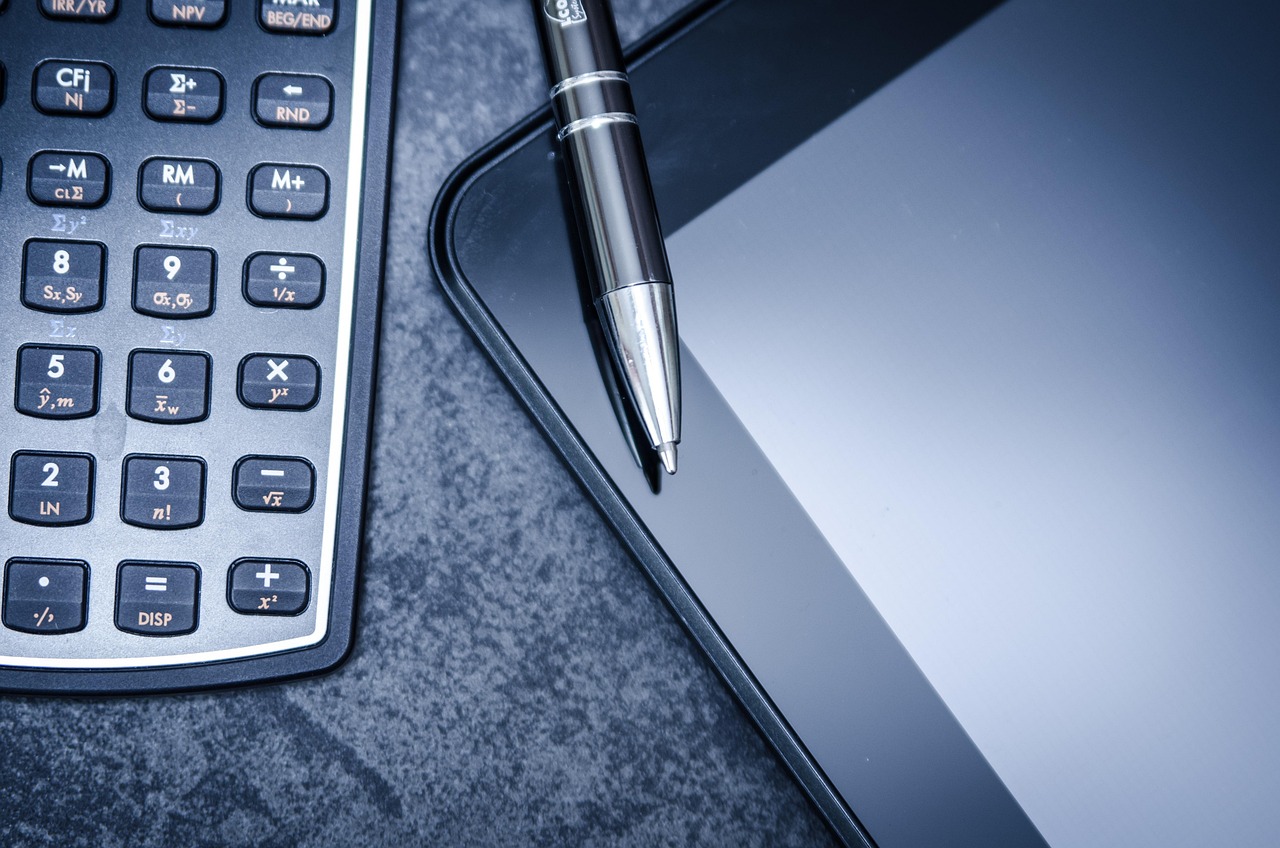 Tablet, calculator, business — Exploring the Role of Dr Austin Harris MD in Modern Perioperative Innovation